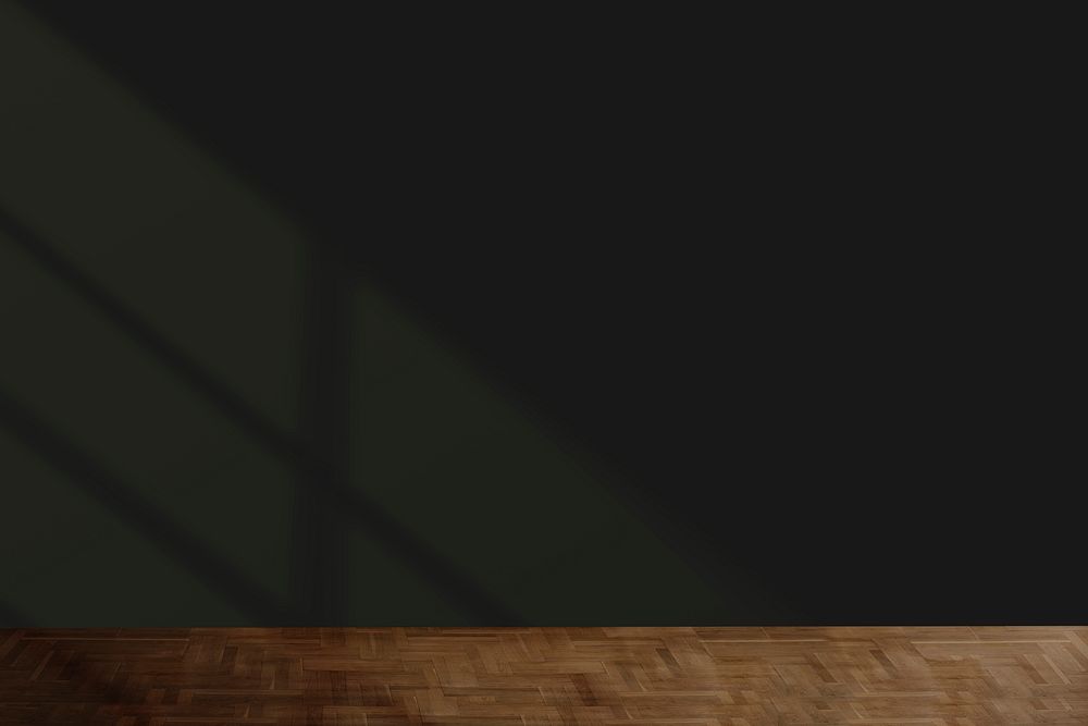 Black wall mockup with a wooden floor