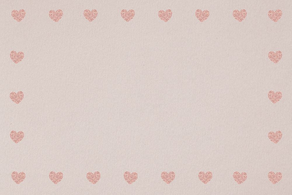 Pink heart patterned frame on a light brown background