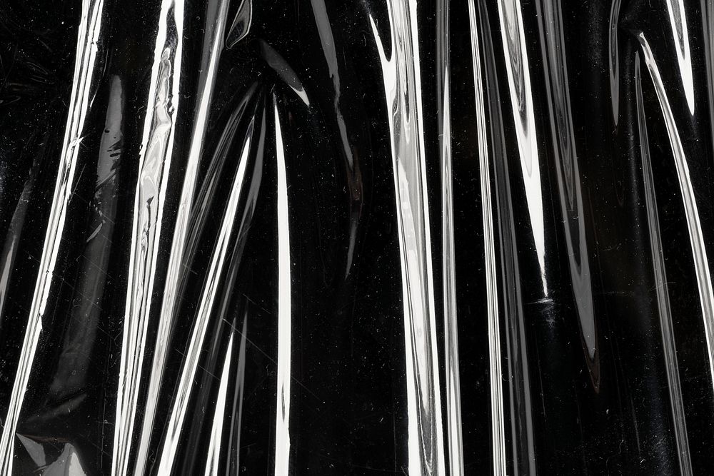 Wrinkled plastic wrap texture metallic black and white wallpaper 