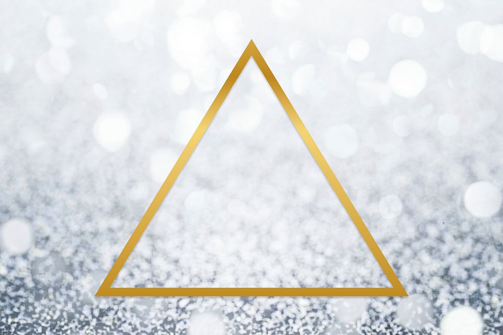 Golden framed triangle on a glitter texture