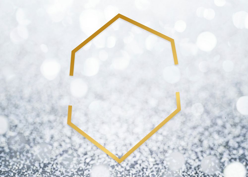 Golden framed hexagon on a glitter texture
