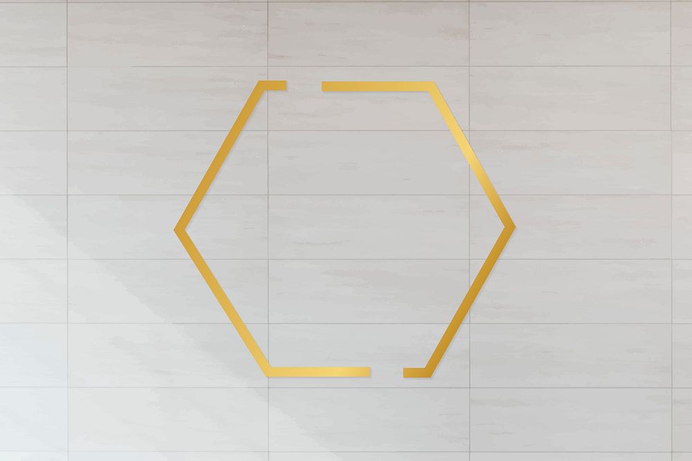 Golden framed hexagon on a tiled textured vector