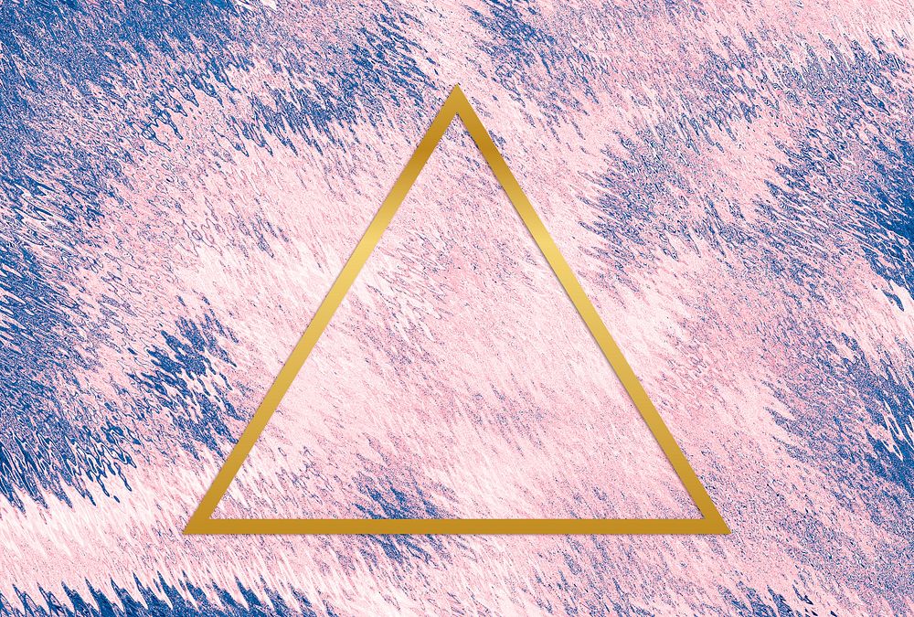 Gold triangle frame on a pink abstract background