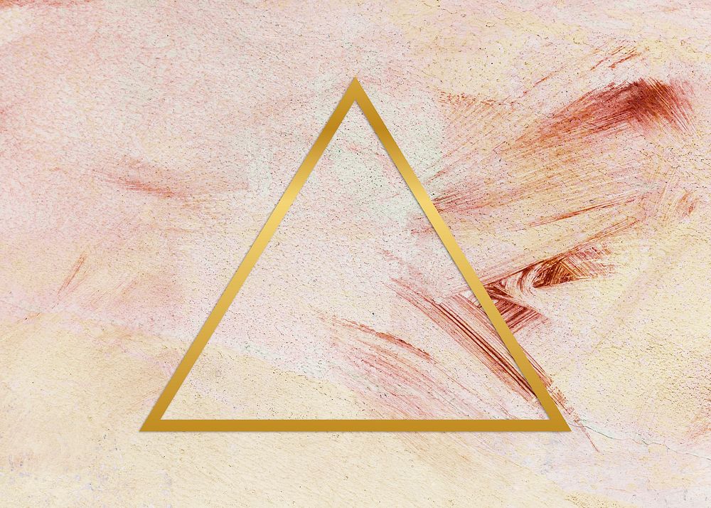 Gold triangle frame on a pink paintbrush stroke patterned background