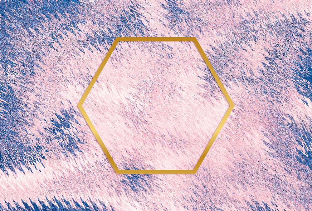 Gold  hexagon frame on a pink abstract background