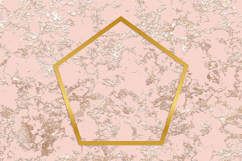 Gold pentagon frame on a rough rose gold background