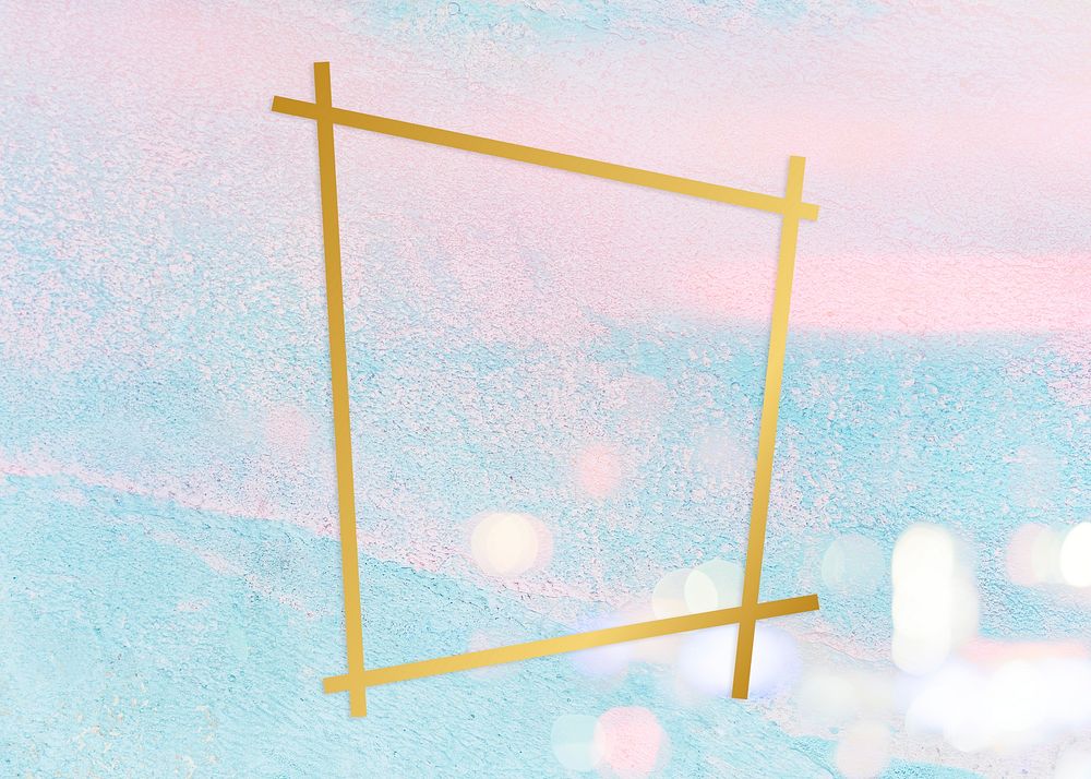 Gold trapezium frame on a pastel pink and blue concrete textured background