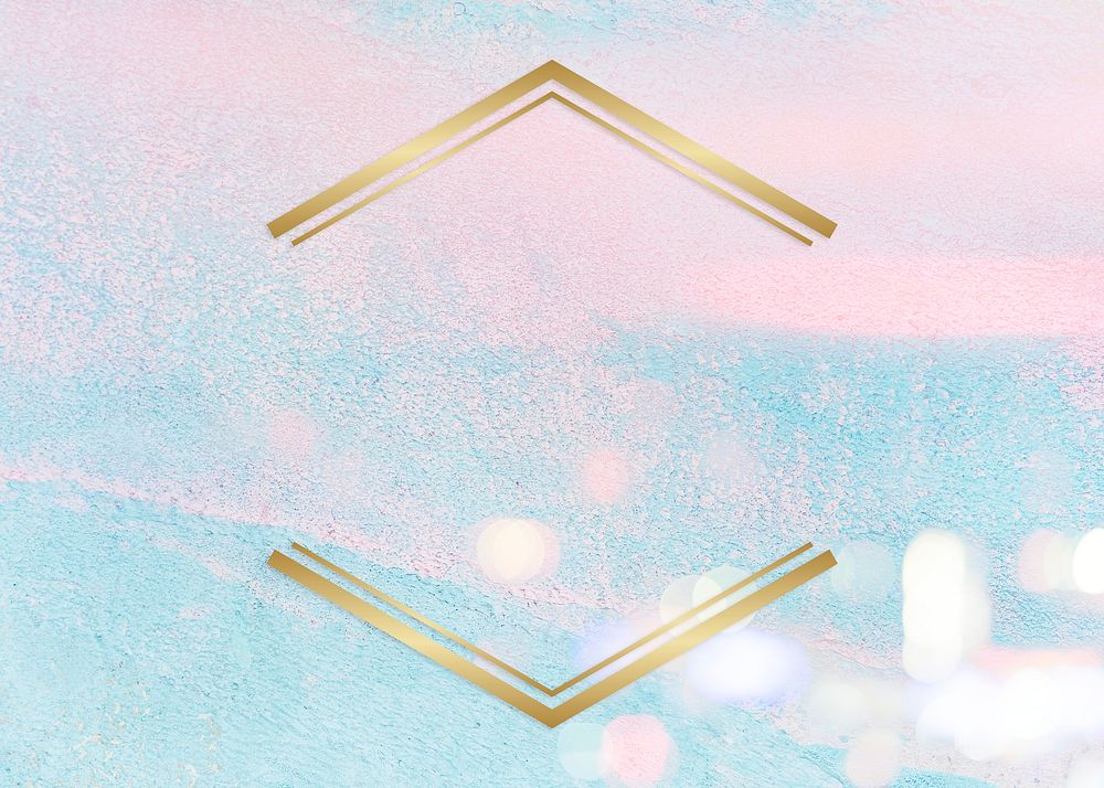 Gold hexagon frame on a pastel pink and blue concrete textured background