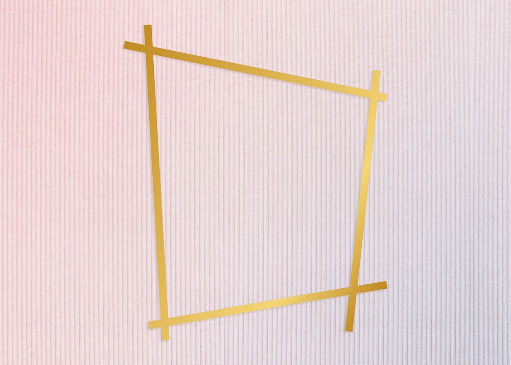 Gold trapezium frame on a pinkish blue fabric background