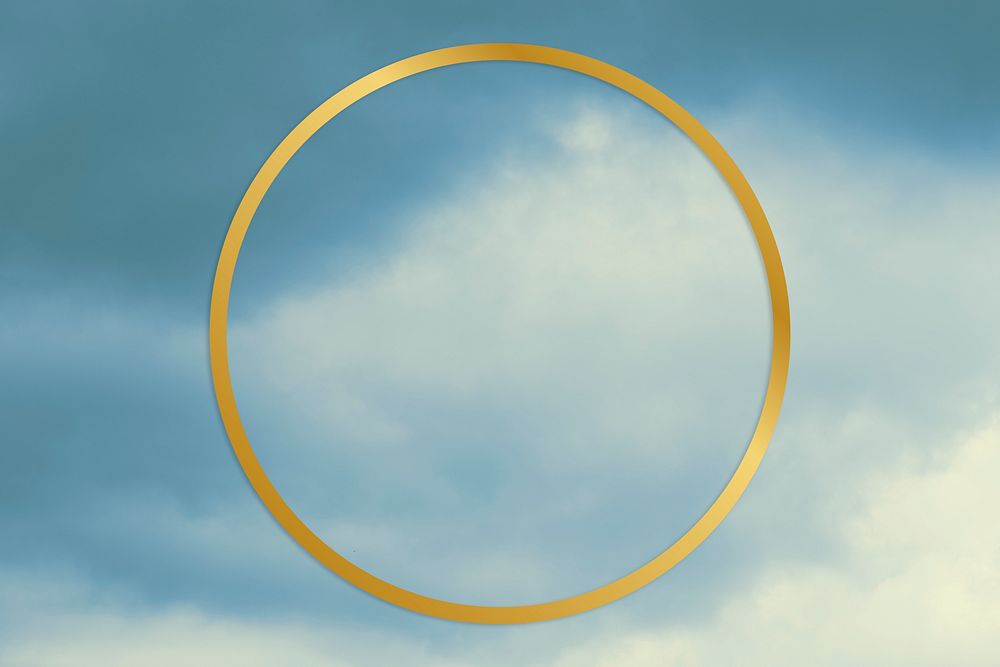 Gold round frame on a blue sky background