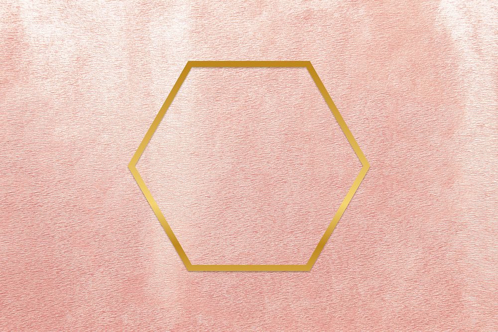 Gold hexagon frame on a rose gold background