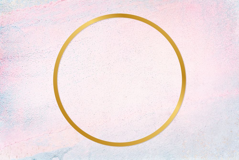 Gold round frame on a pastel concrete background