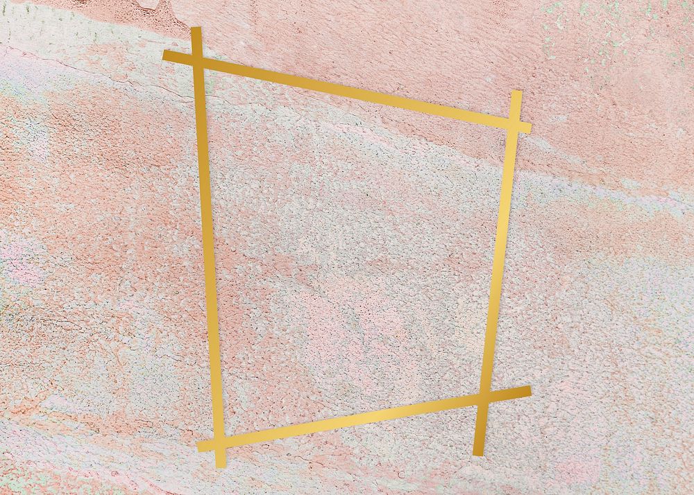 Gold trapezium frame on a rustic pastel pink background