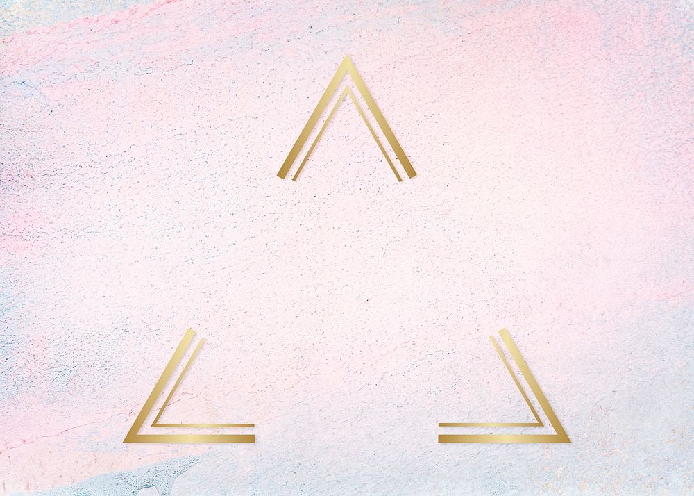 Gold triangle frame on a pastel concrete background