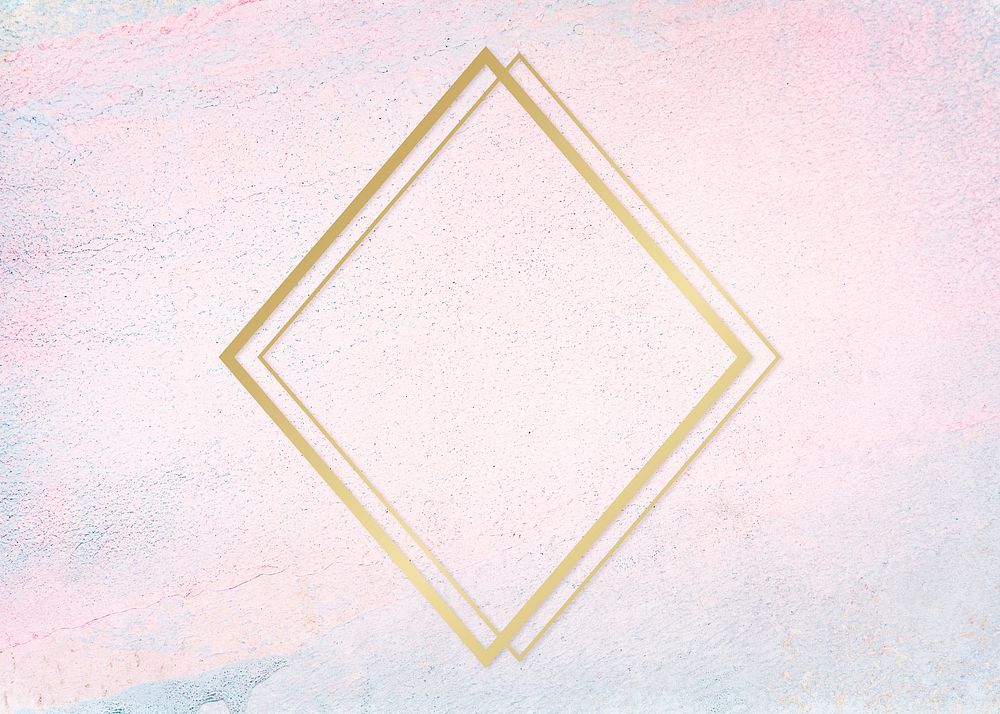 Gold rhombus frame on a pastel concrete background