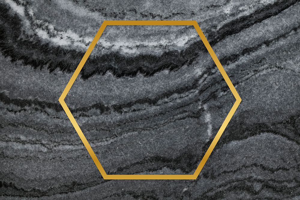 Gold hexagon frame on a gray marble textured background