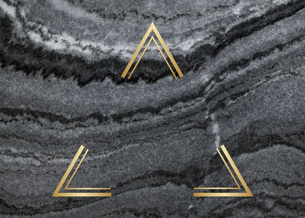 Gold triangle frame on a gray marble textured background