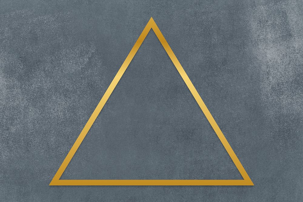 Gold triangle frame on a gray concrete textured background