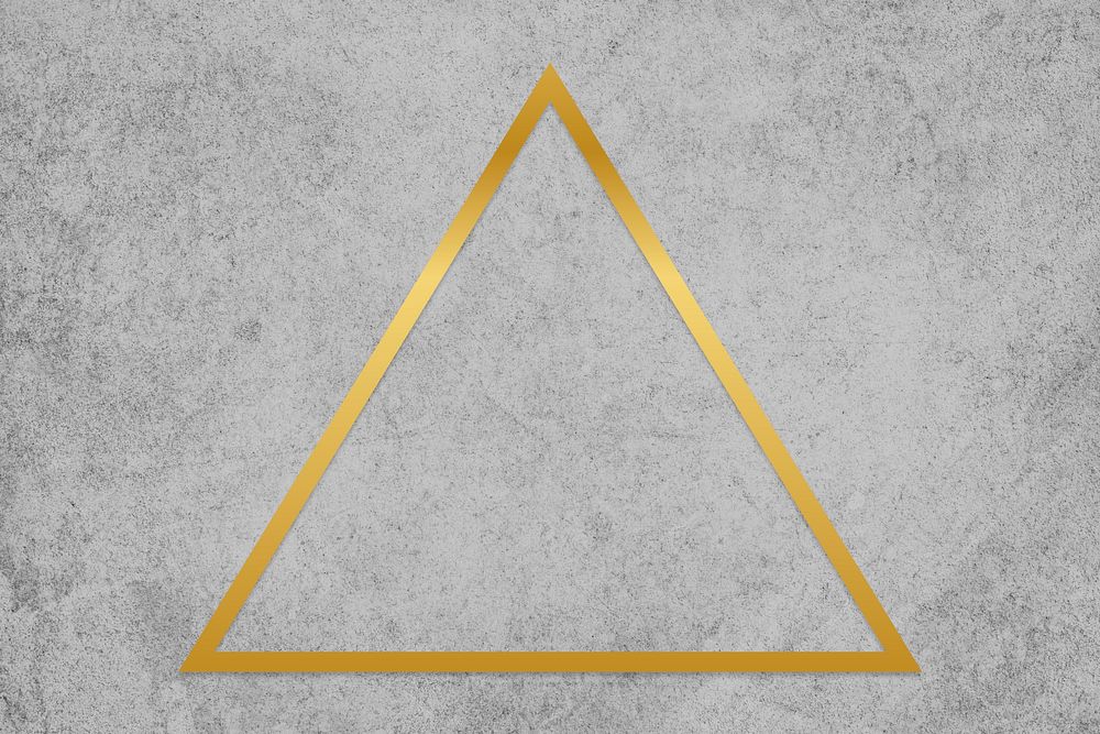 Gold triangle frame on a gray concrete textured background