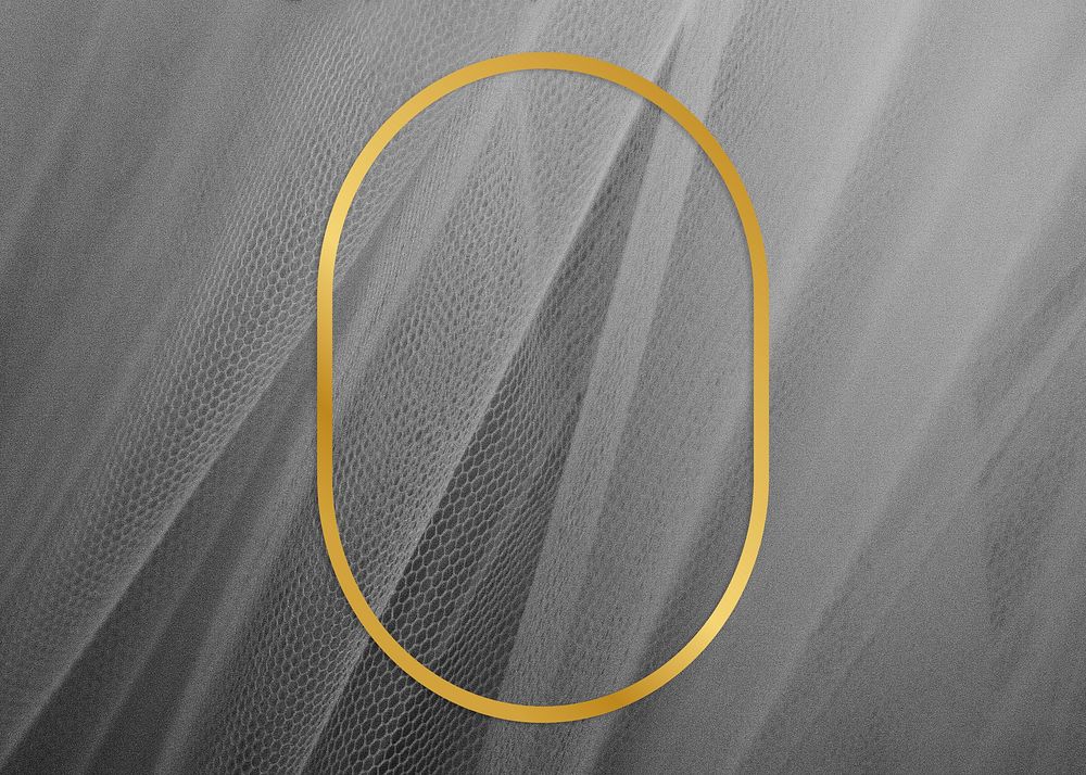 Golden framed oval on a gray fabric texture