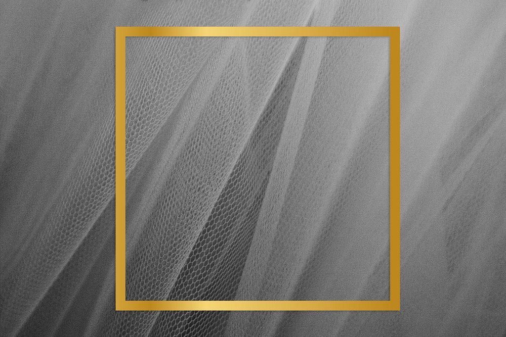 Golden framed square on a gray fabric texture