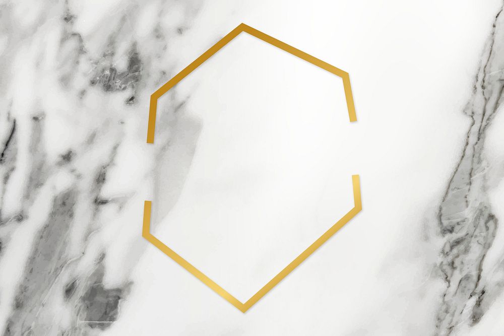 Golden framed hexagon on a marble texture