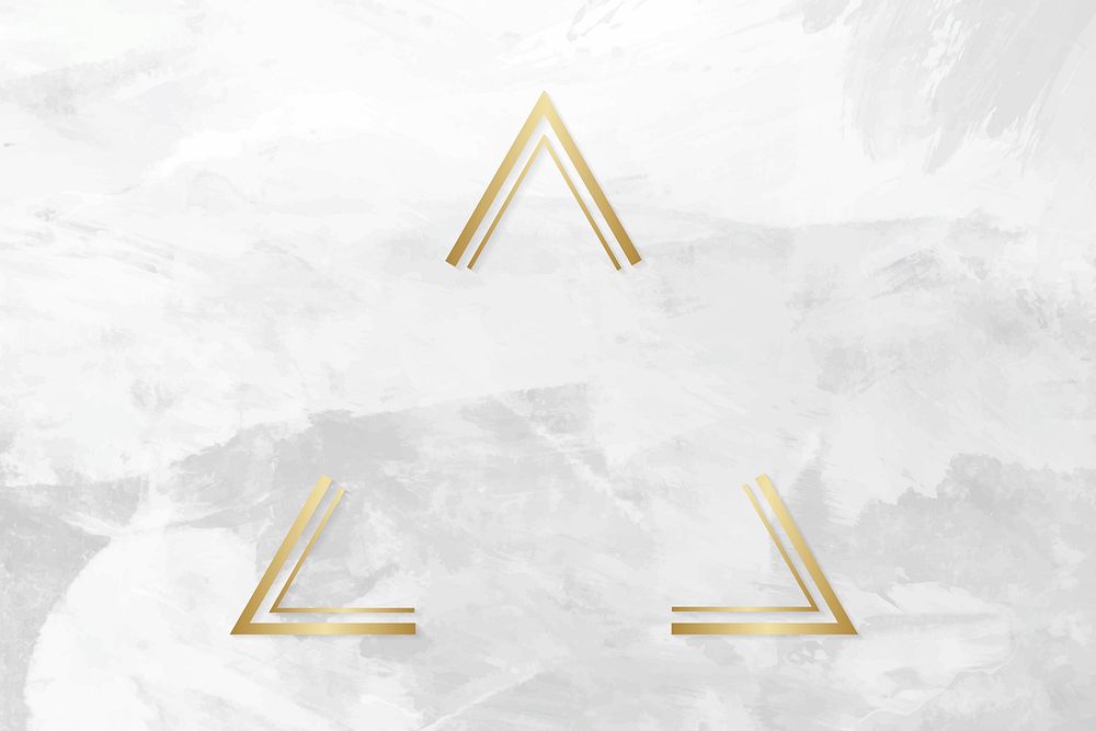 Gold triangle frame on a gray concrete textured background vector