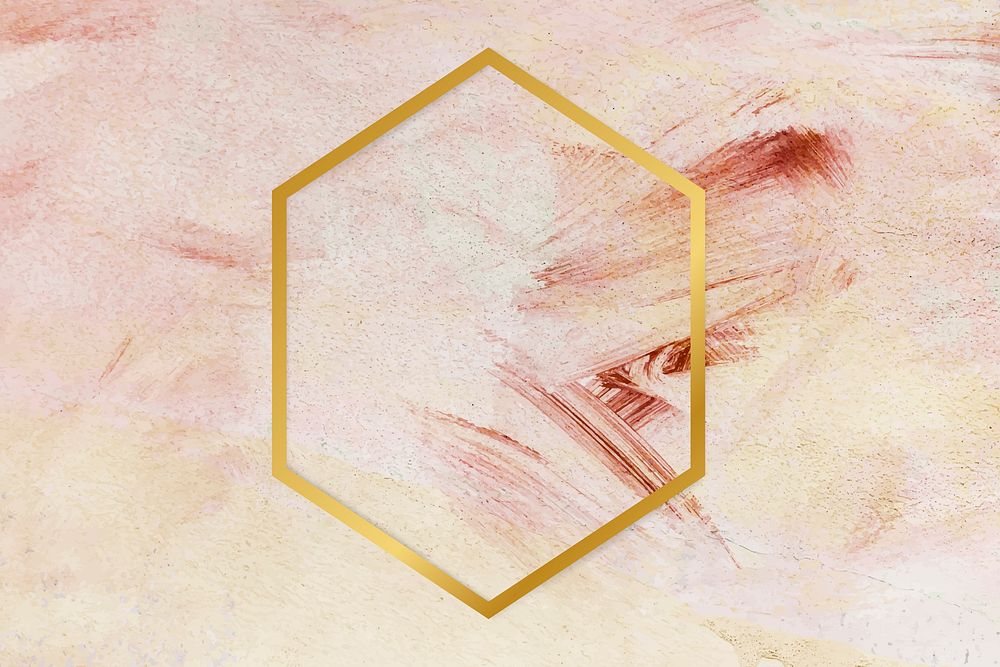Gold hexagon frame on a pink paintbrush stroke patterned background vector