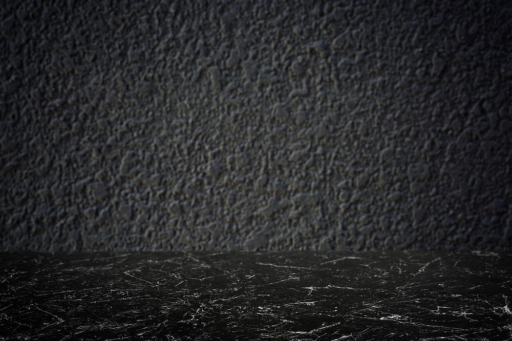 Rough dark gray cement wall with black marble floor product background