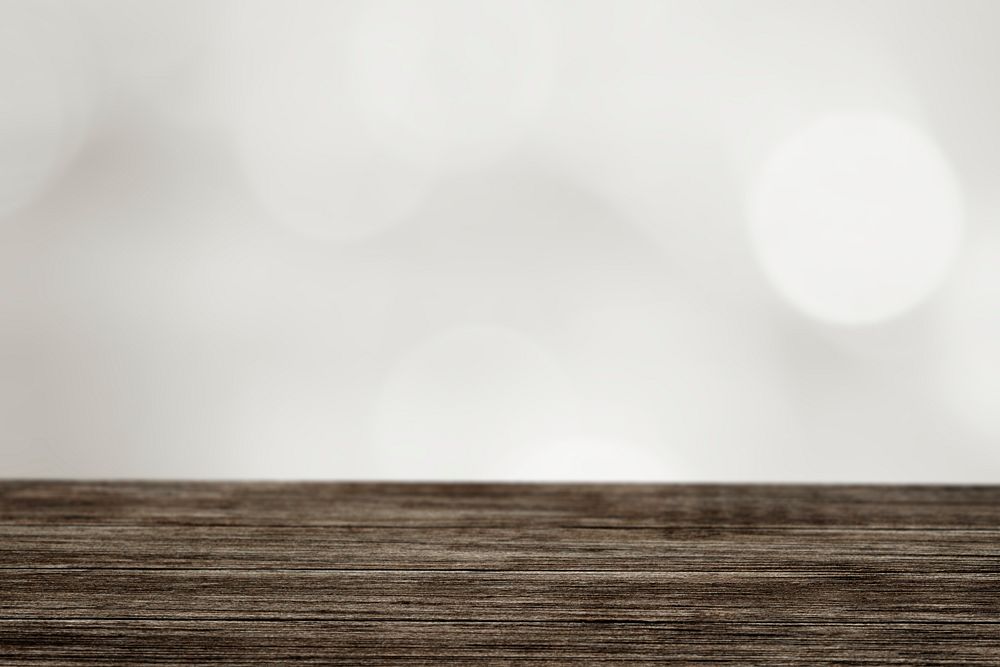 Wooden  plank with gray bokeh pattern background