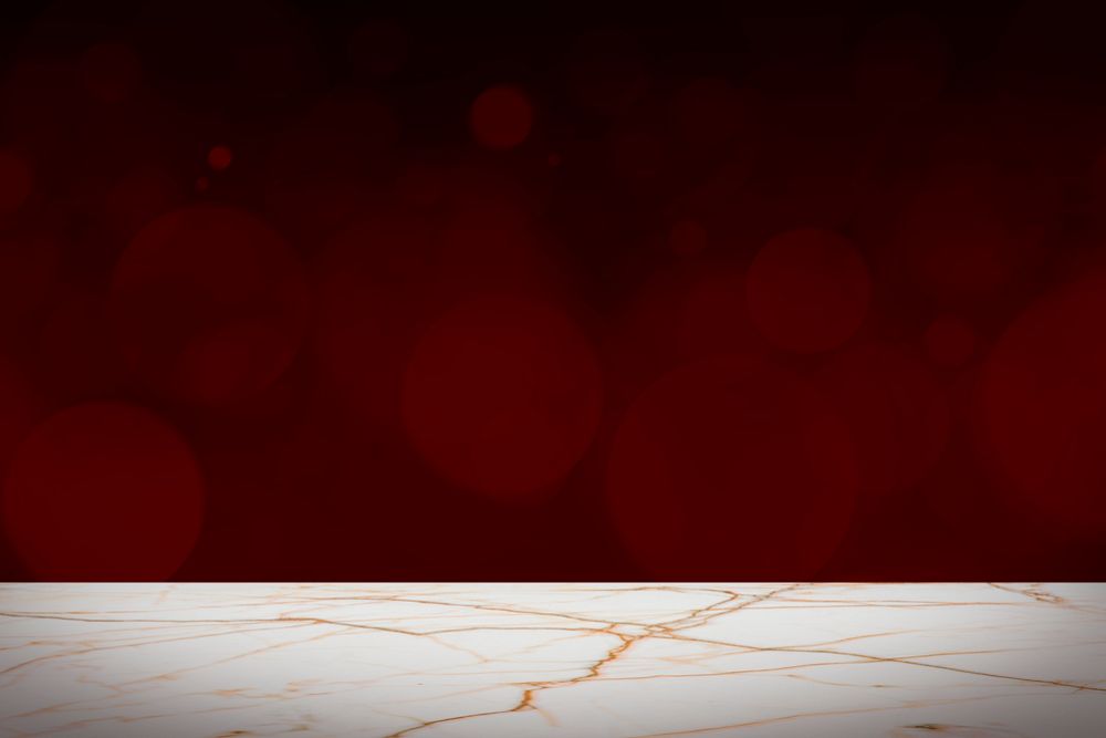 Dark red bokeh background with white marble