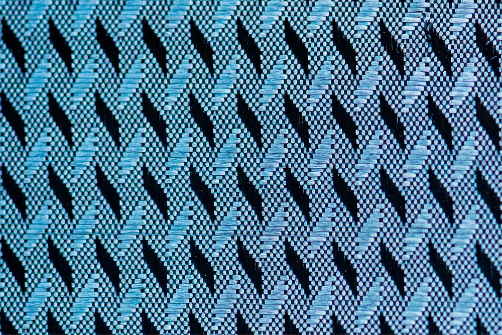 Zigzag patterned blue fabric textured background vector