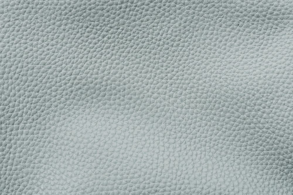 Baby blue leather textured background vector