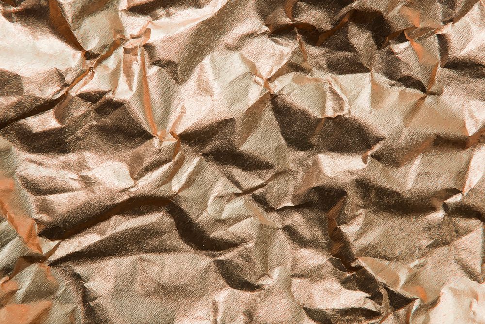 Crumpled gold paper background vector