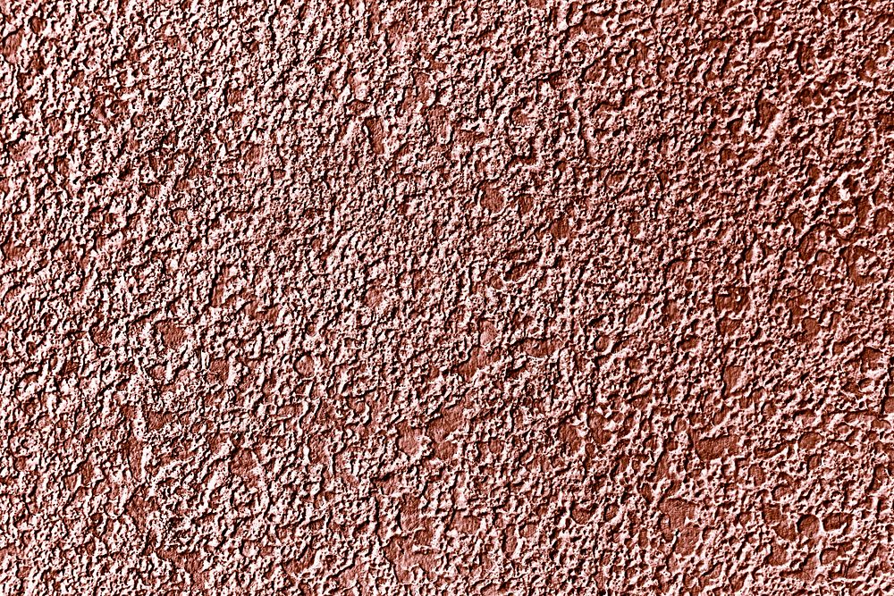 Roughly pink gold painted concrete wall surface background