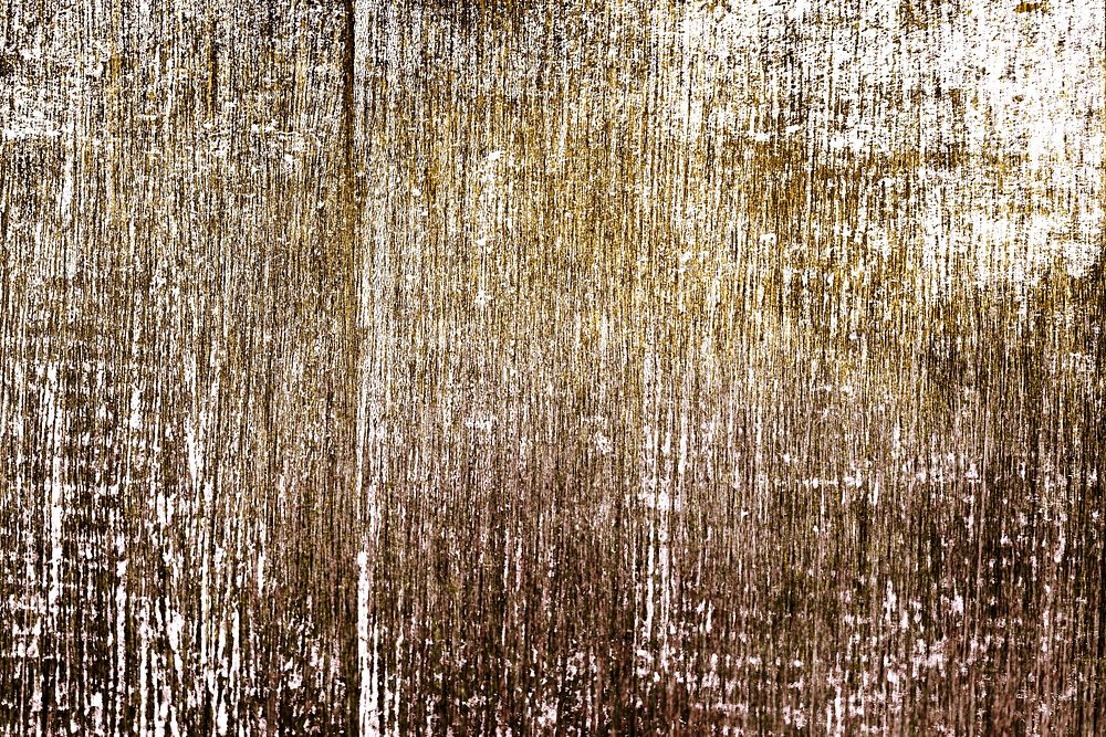Rustic gold paint textured background
