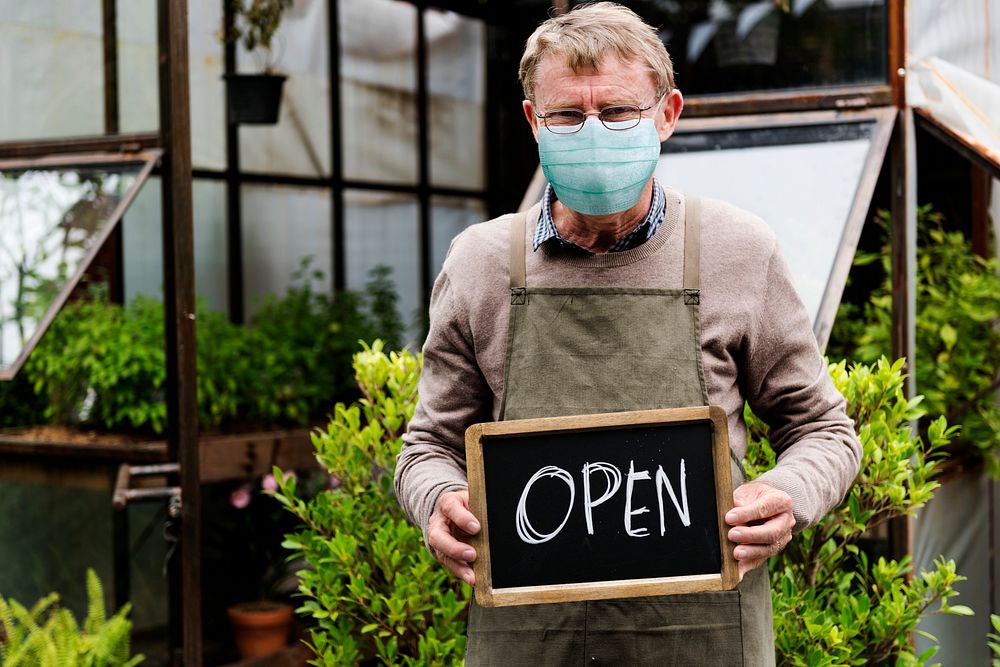 New normal business owner wearing a mask 