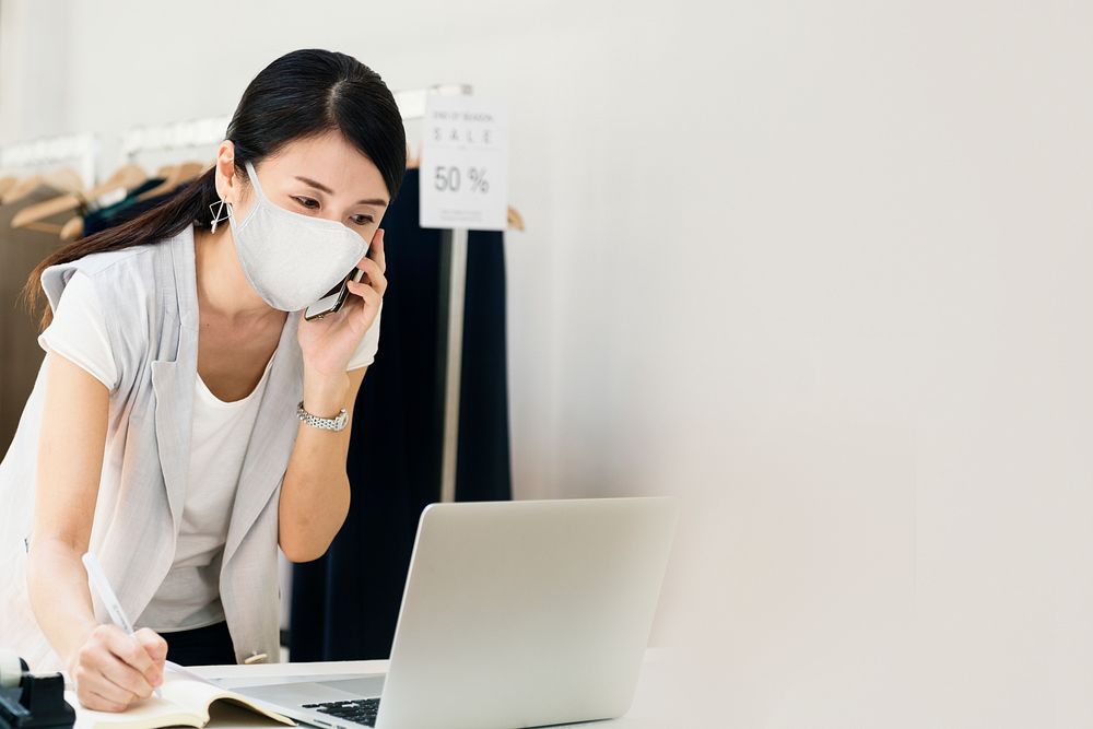 Japanese sales woman in mask new normal with copy space