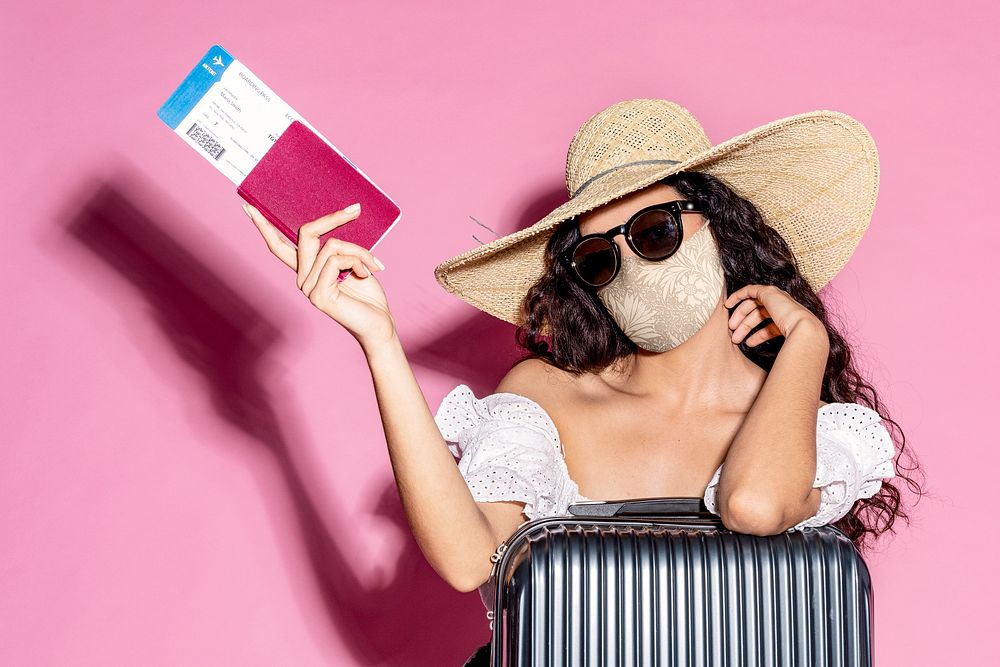 Summer trip in coronavirus pandemic woman in face mask