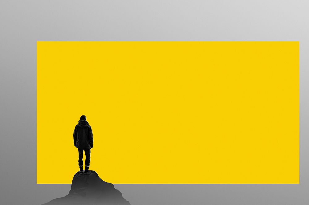 Yellow banner psd man standing on top of hill background