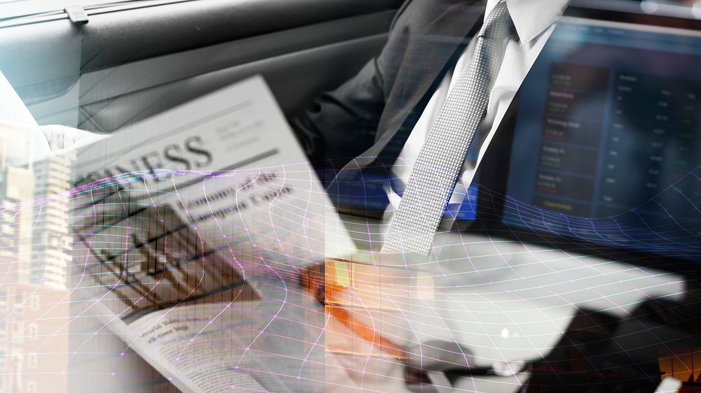 Businessman reading newspaper at his car background