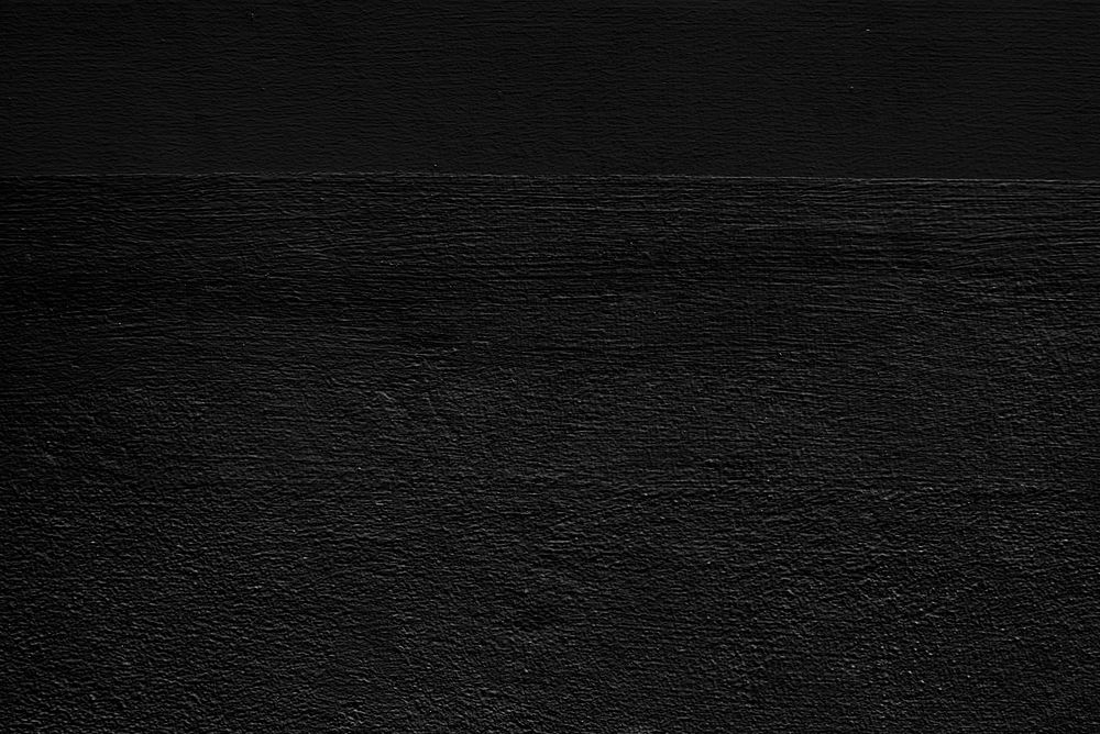 Black plain concrete textured background