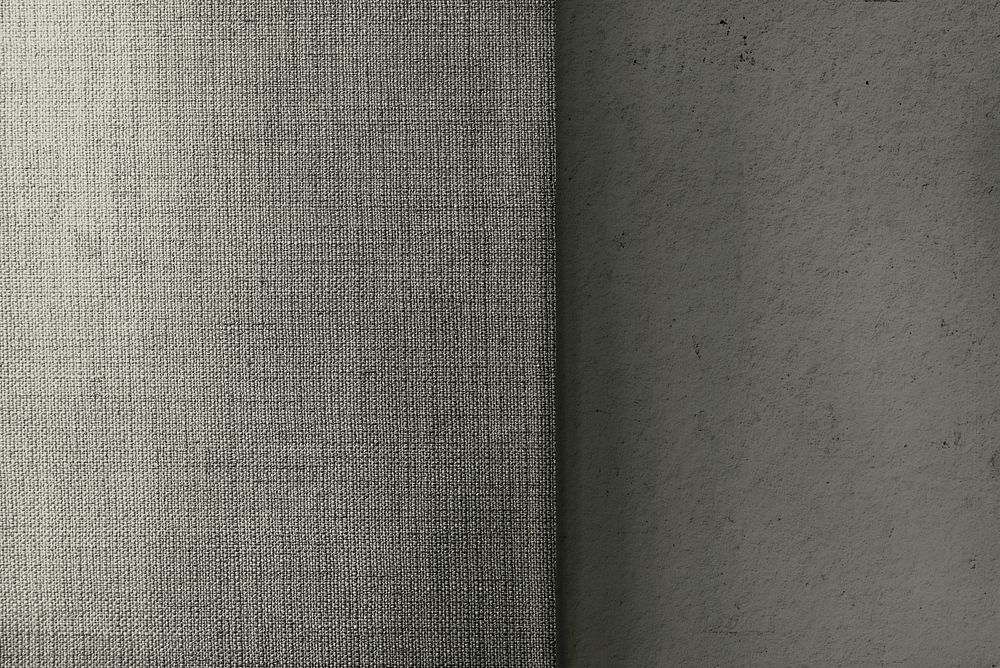 Beige concrete and canvas fabric textured background
