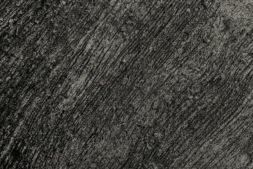 Grunge scratched black and gold concrete textured background