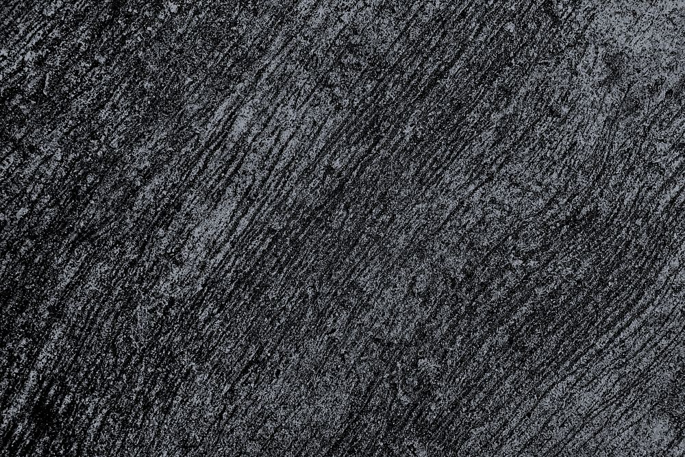 Grunge scratched black concrete textured background