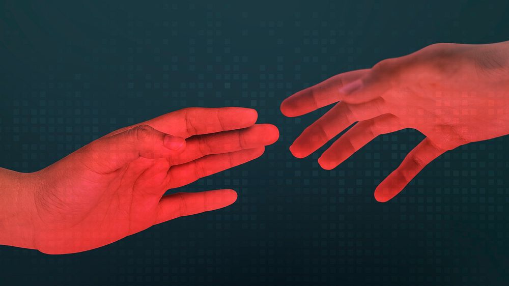 Human red hands reaching for each other