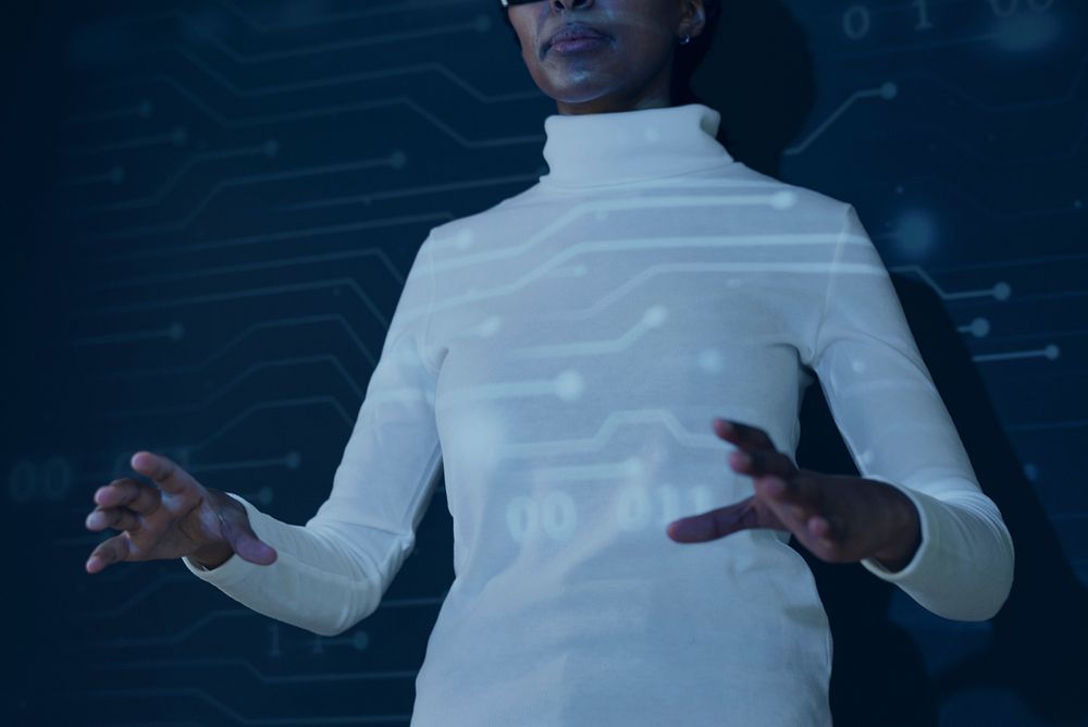 Woman using virtual screen futuristic technology