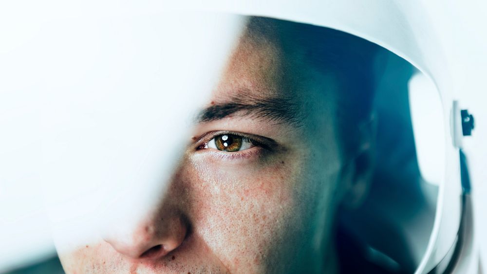 Male astronaut with glass helmet social media cover