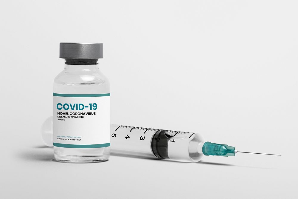Covid 19 vaccine vial mockup psd with a needle syringe