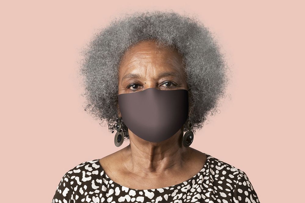 Mature woman wearing mask for Covid-19 prevention campaign